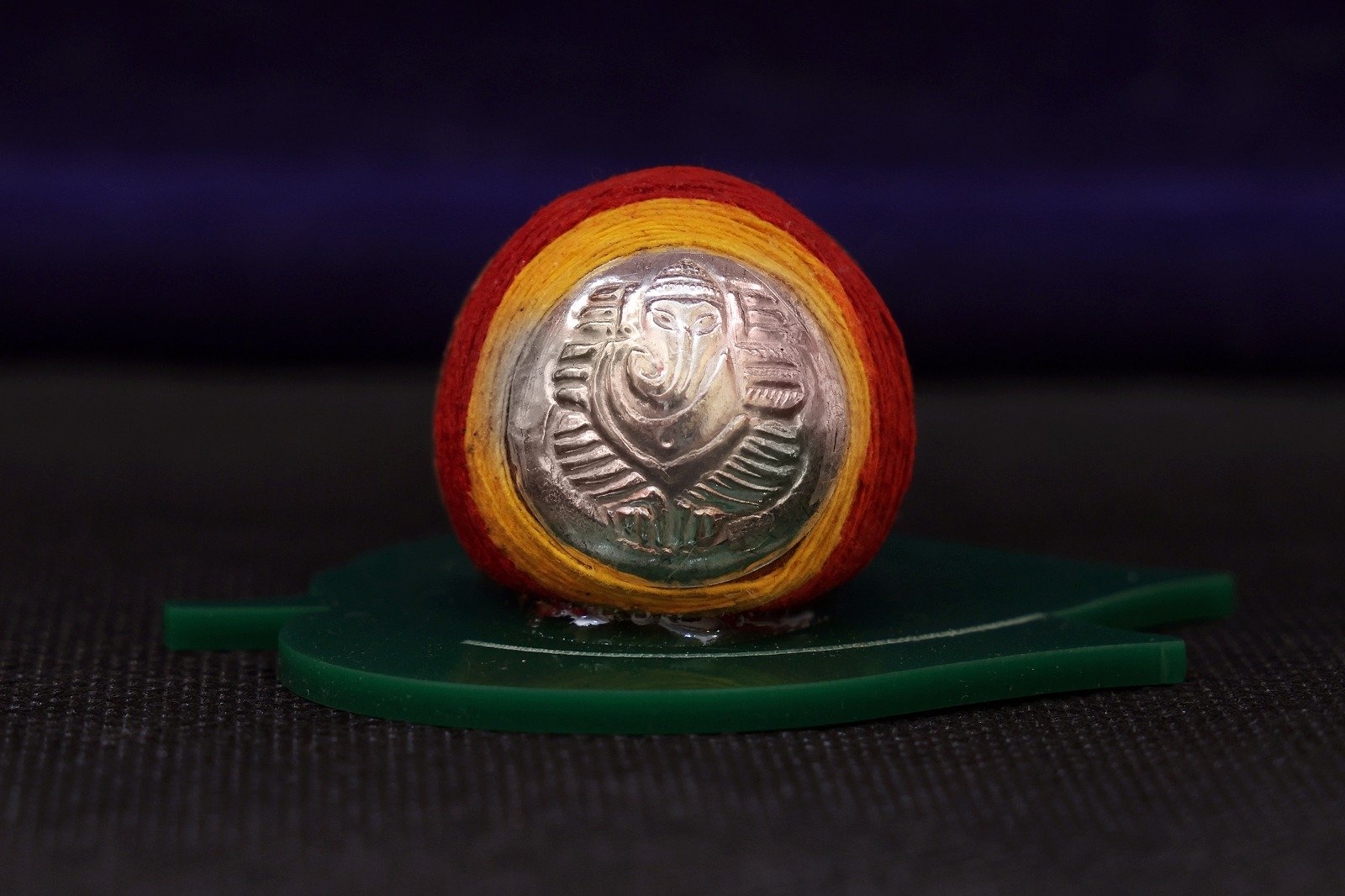 Paku, Vethalai, and Coconut with Silver Ganesha